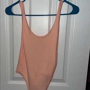 peach body suit